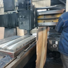 Workers at Drax Molds are manufacturing block-making machine molds in the workshop.
